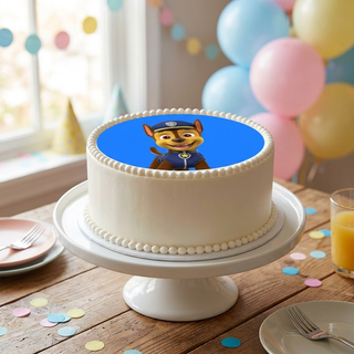 Paw Patrol (Chase) Cake Topper shown on a cake at a birthday party